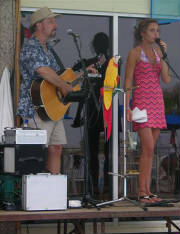 Photo of Julie Dubela singing with Dave Weber on guitar at “The Shell” on Long Beach Island, New Jersey