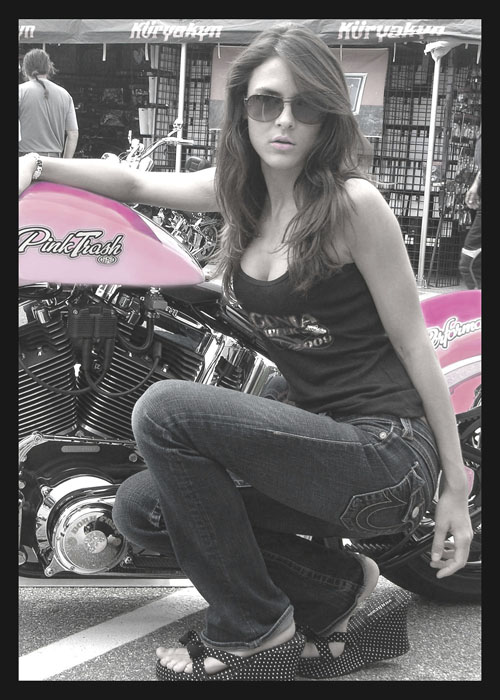 Photo of Julie Dubela with a Harley