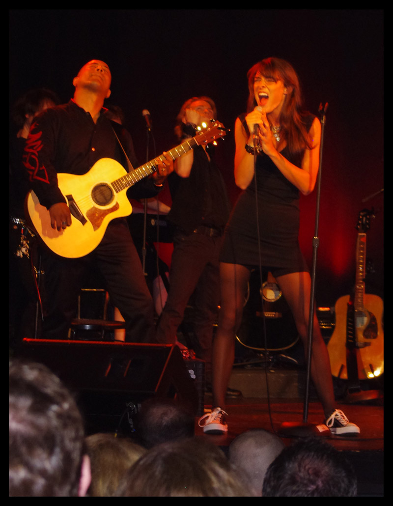 Photo of Julie Dubela performing with the Ultrasonic Rock Orchestra