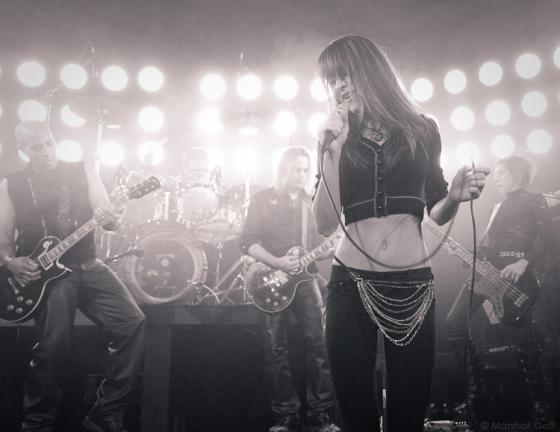 Photo of Julie Dubela performing with the Ultrasonic Rock Orchestra