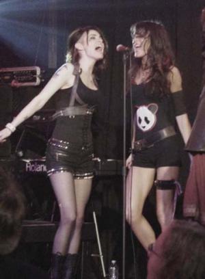 Photo of Julie Dubela performing with the Ultrasonic Rock Orchestra