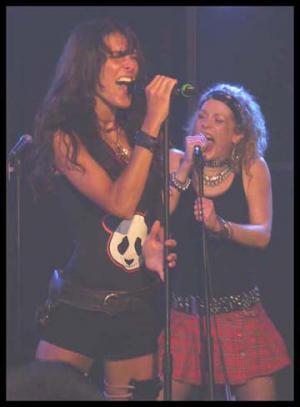 Photo of Julie Dubela performing with the Ultrasonic Rock Orchestra