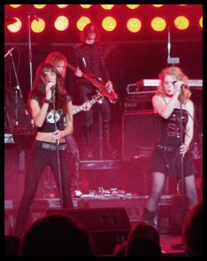 Photo of Julie Dubela performing with the Ultrasonic Rock Orchestra