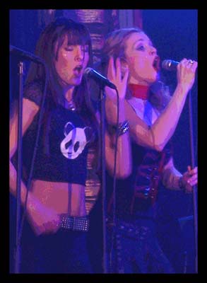 Photo of Julie Dubela performing with the Ultrasonic Rock Orchestra