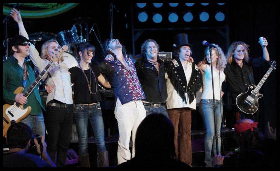 Photo of Julie Dubela performing with the Ultrasonic Rock Orchestra